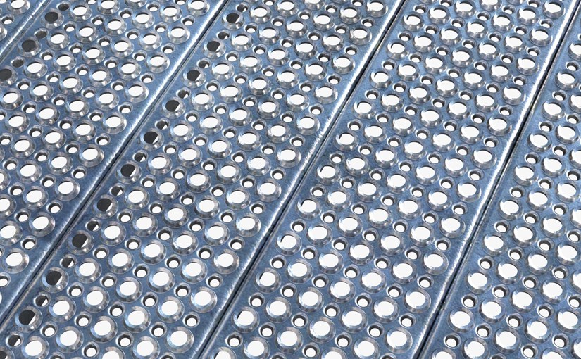 Round punched hole gratings