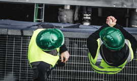 Manual Workers Standing On Metal Grate In Factory 491564188 3840X5760