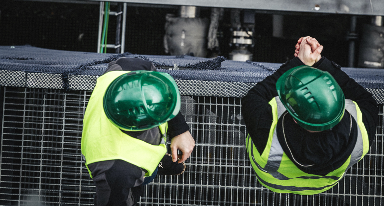 Manual Workers Standing On Metal Grate In Factory 491564188 3840X5760