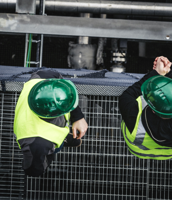 Manual Workers Standing On Metal Grate In Factory 491564188 3840X5760 (2)