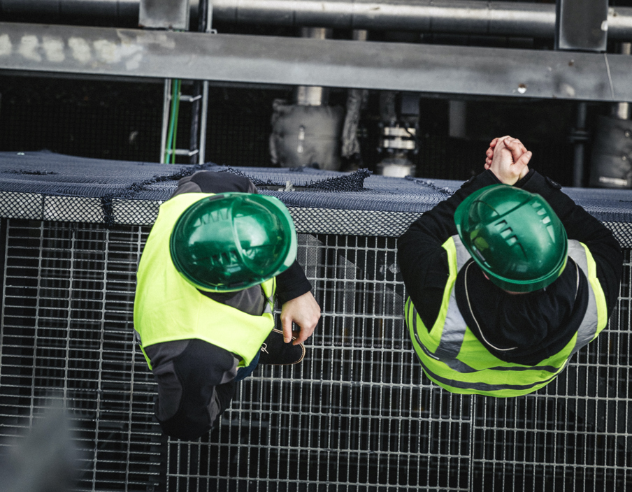 Manual Workers Standing On Metal Grate In Factory 491564188 3840X5760 (2)