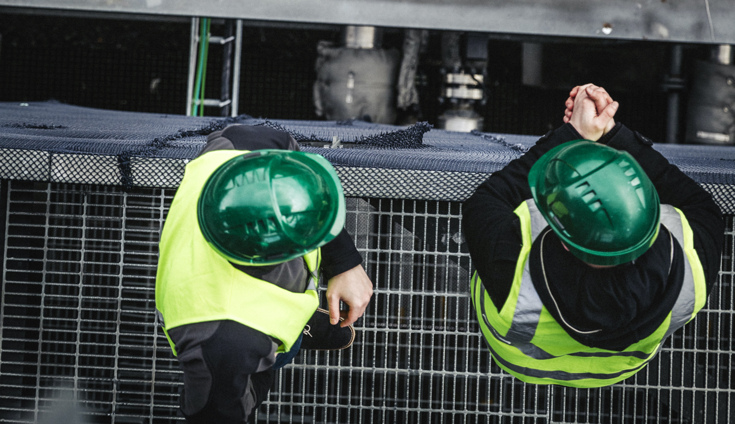 Manual Workers Standing On Metal Grate In Factory 491564188 3840X5760 (2)